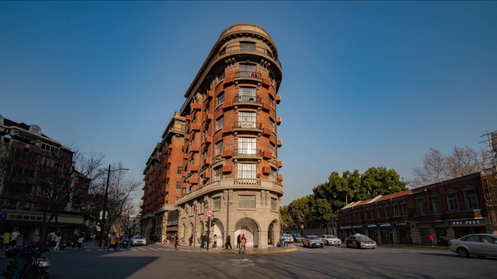 千库网 上海地标武康大楼黄昏交通摄影 摄影图编号20443623